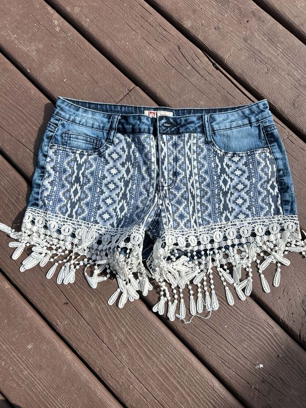 l.e.i. Ashley Lowrise Aztec Print Denim Shorts with Lace Tassel Fringe